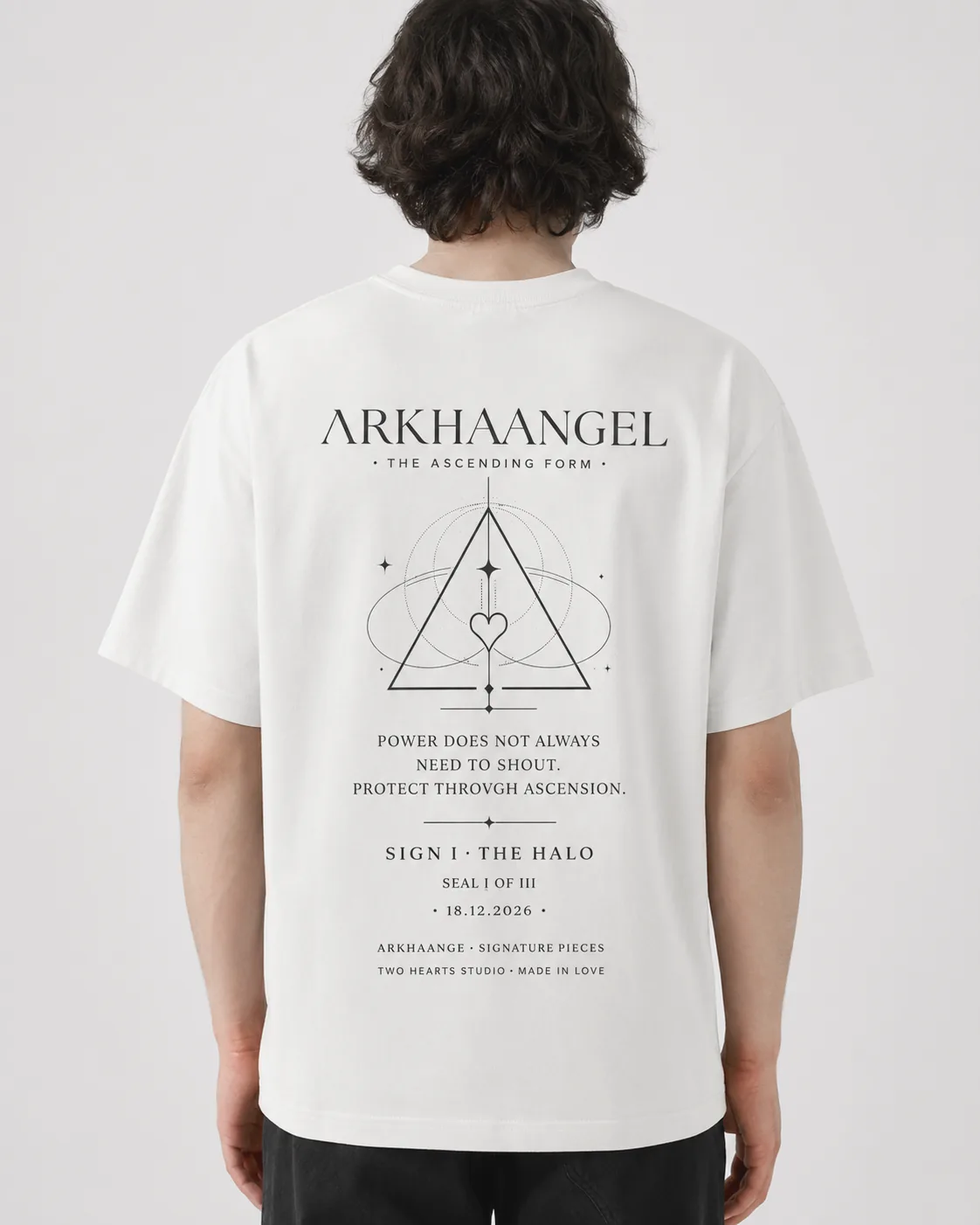 Back view worn: the full SIGN I inscription across the shoulders.