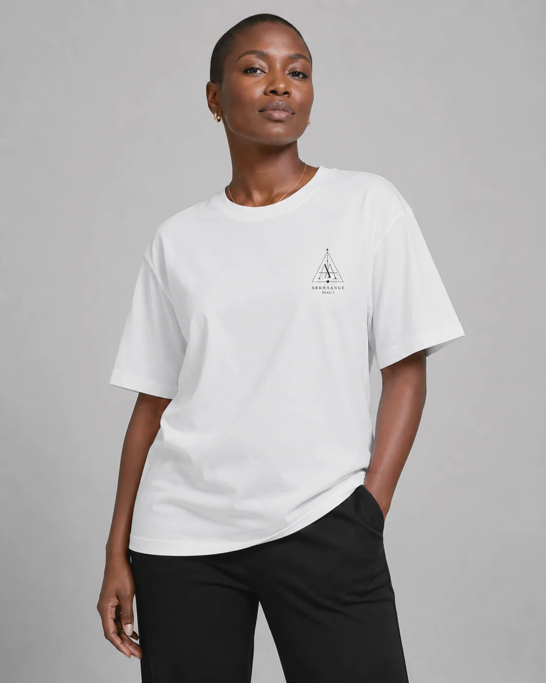 Front view of the bone tee, chest sigil visible.